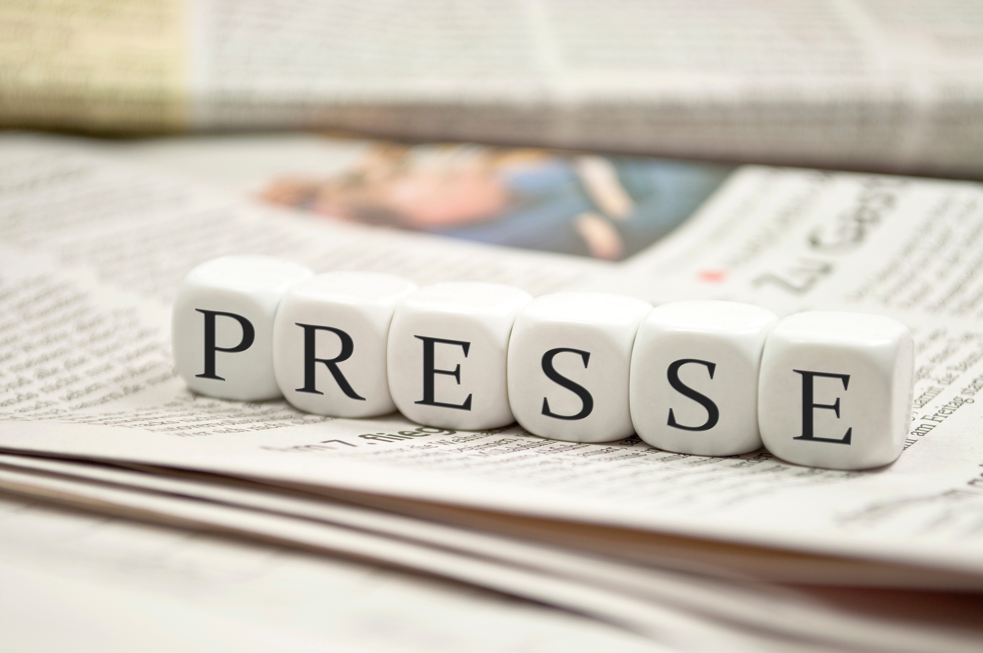 Press with newspapers
