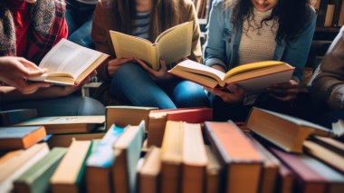 A group of friends reading books together.